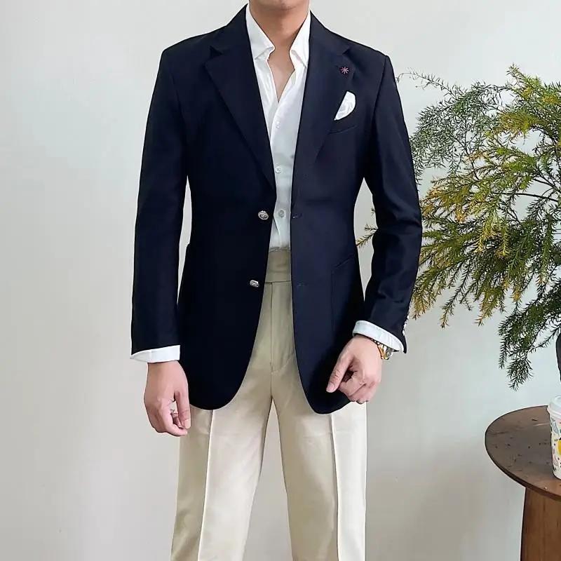 Blazer croisé pour homme à revers pointus et boutons dorés